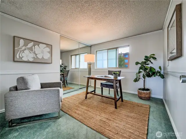 Third bedroom offers versatile space—ideal as a guest room, office, or cozy TV nook.