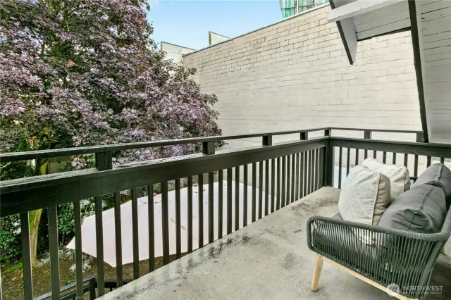 The primary bedroom's private balcony.