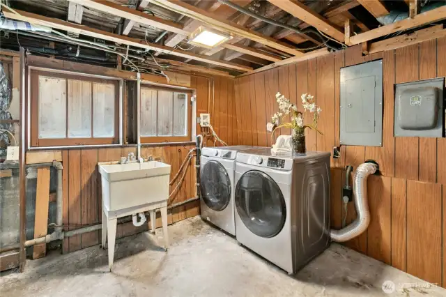 The laundry area has an always-handy sink, and the washer and dryer are included in the sale.