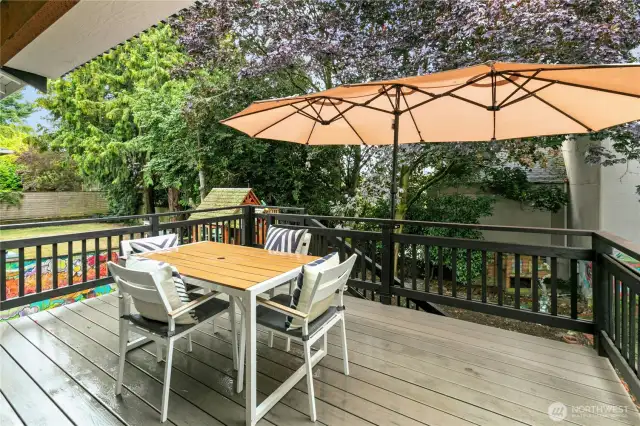 The main-level's easy-to-maintain Trex-type deck is a shady spot perfect for enjoying those long summer nights.