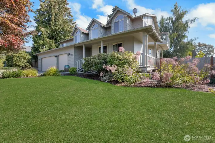 Welcome to this large 5 bedroom home with a 3 car garage & Wrap Around porch!