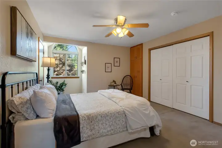 Bedroom #2 has built in cabinets, large closet, plus a walk in closet to the right of the bed.