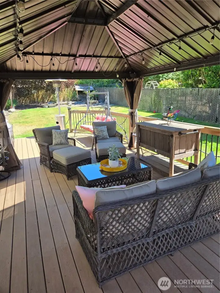 Another view of the deck with furniture.