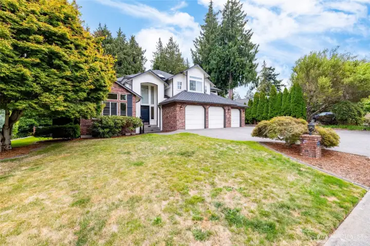 Level .34 acre lot with fenced yard, 3 car garage, plenty of parking - room for your RV or boat.