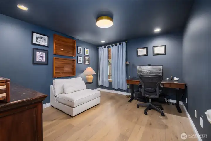 Main floor home office is the perfect space to work from home (WFH).  Or, make this your craft room, den, or library.