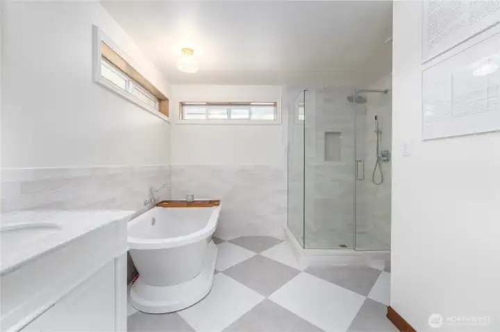 This truly spa-like en-suite bath exudes luxury and invites you to relax.  Marble and tile, all new shower, tub, double vanity.