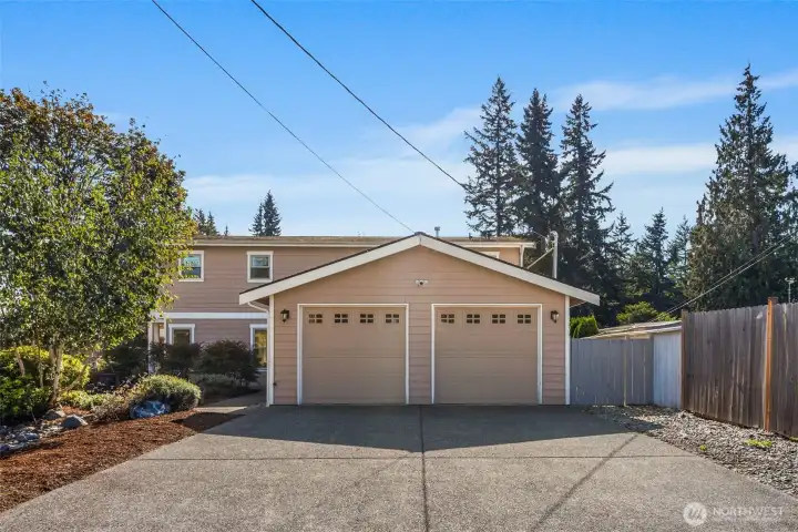 Spacious 2 car garage with room for storage.
