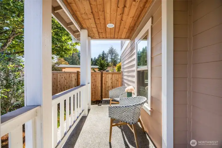 Front porch with room for relaxing or to line with plants and decorations.