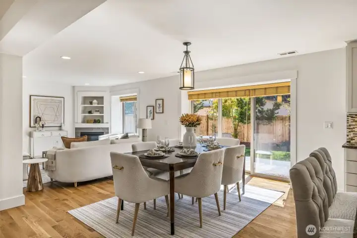Spacious dining area to gather and eat, as well as access to the back yard.