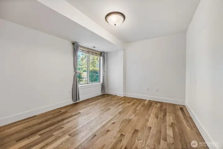 Large room on the main floor can be used for guests, a private office, a craft room, and more.