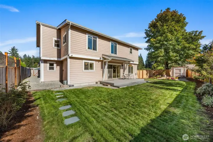 The fully fenced back yard is perfect to relax, garden, or play on our beautiful PNW days.