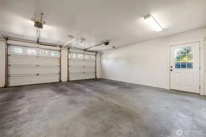 The spacious attached 2 car garage has room for additional storage.