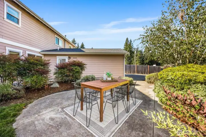 The front yard has space to relax or dine.