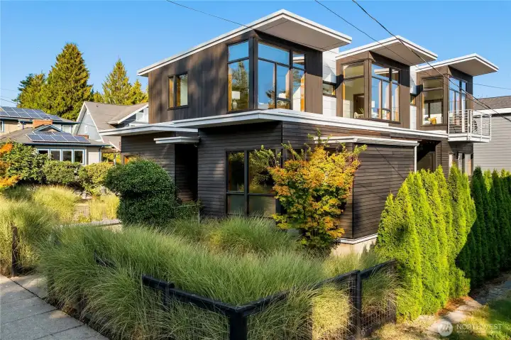 Walls of glass and clean lines frame this 2017-built gem, showcasing modern design in the heart of Wallingford.