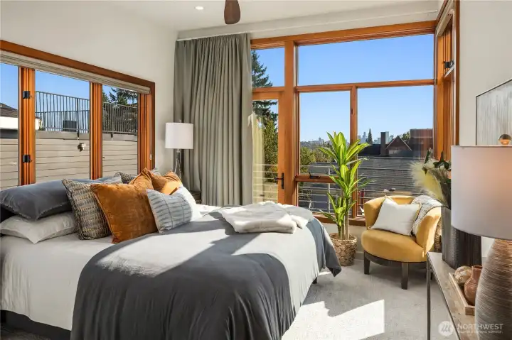 The primary suite captures city views, wrapped in natural light and calming modern design.