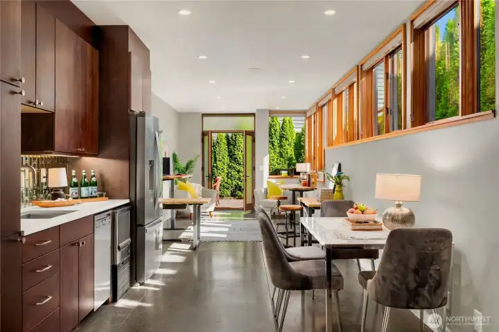Bright and spacious with walls of windows, this lower-level suite is perfect for guests or extended stays.