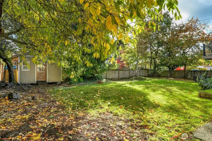 Lots of privacy here amidst mature, well-established landscaping, creating a tranquil and inviting outdoor setting.