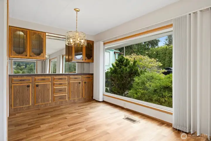 Dining area with built in buffet and shelving area.