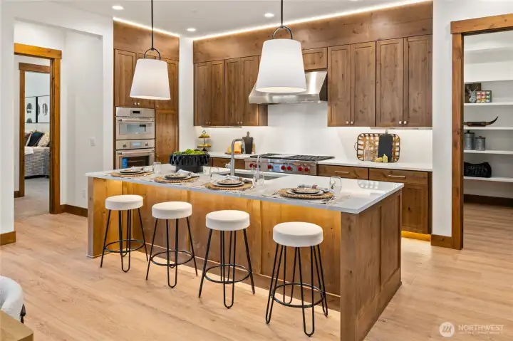 9 foot island with additional storage and ample barstool seating