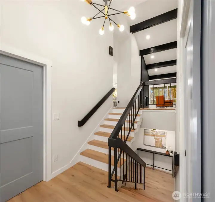 Spacious entry way leads you into this gorgeous remodeled home, with no surface left untouched.
