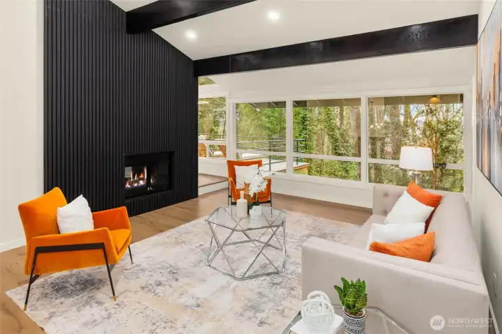 Large windows throughout create a light and bright, inviting space