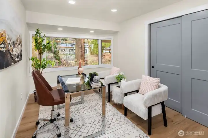 Versatile space off of the living room. Many possibilities here - office, additional living space, workout area.