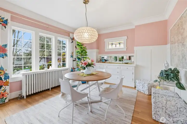 Original built-ins, stained glass accents, and oak hardwood & fir floors create a home rich with patina & timeless appeal.