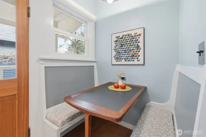 Original built-in breakfast nook in the eat-in kitchen.