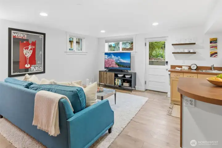 the lower level expands the home’s versatility w/ abundant storage, laundry & a private MIL suite w/ separate entrance—ideal for visiting guests, extended stays or income potential.