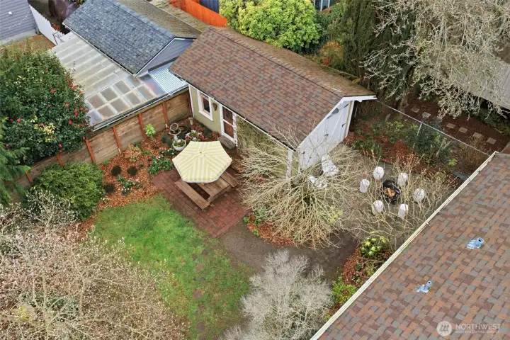 Drought-resistant landscaped lot provides garden beds plus room for the pup to do figure 8’s & space to entertain friends all summer long.