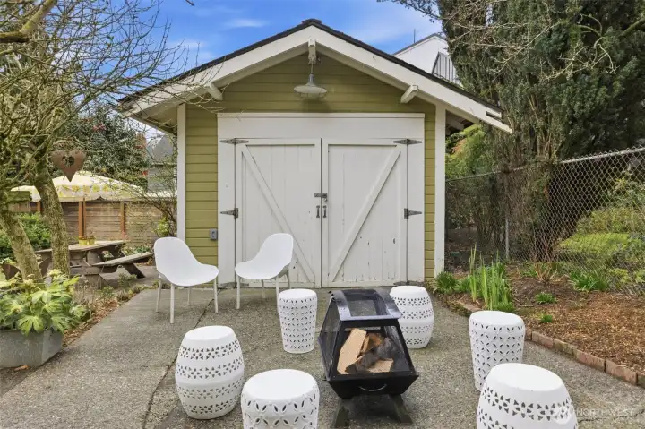 Level patio is a great spot to gather with friends around the fire pit.