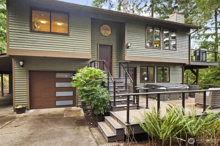 Impressive exterior upgrades include new paint, new windows, a new garage door, and professionally curated landscape lighting that enhances the home’s curb appeal.