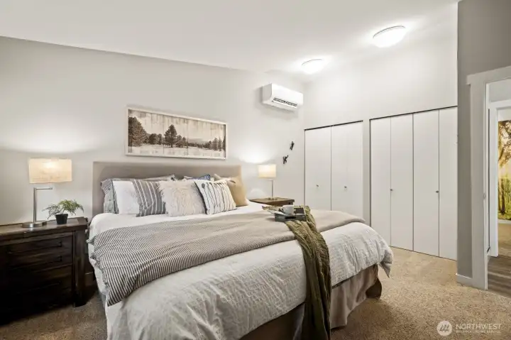 Primary bedroom featuring double closets for ample storage.