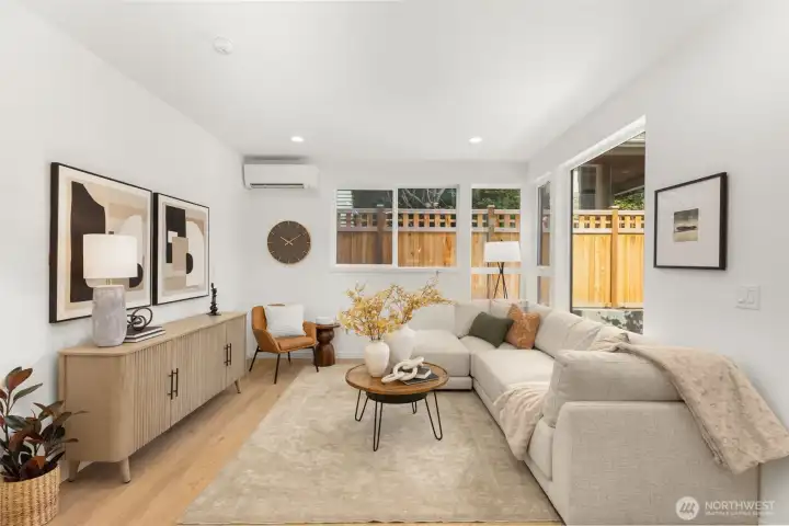 Enjoy natural light and neighborhood views from the large window perfectly framed over the kitchen sink.