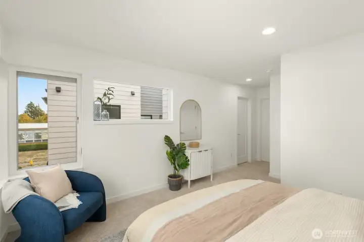 Large windows ensure every room in the home feels connected to the outdoors and filled with light.