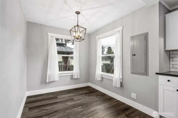 Extra kitchen eating space looking over playset and back yard