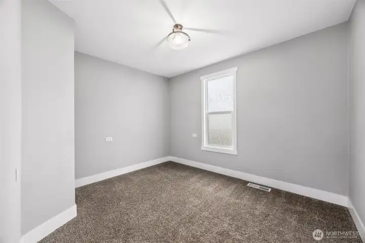 Downstairs bedroom just off full bathroom