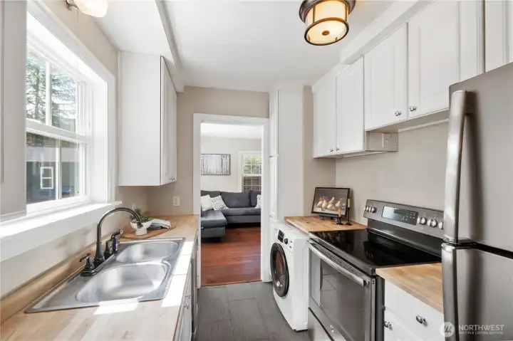 Light filled kitchen overlooking 3.6 acres