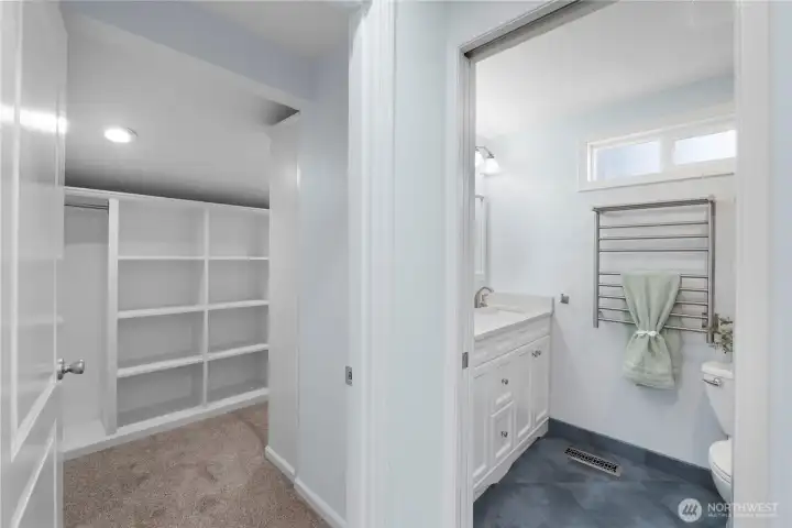Check out this custom closet. And yes, there is a smaller closet on the opposite wall.