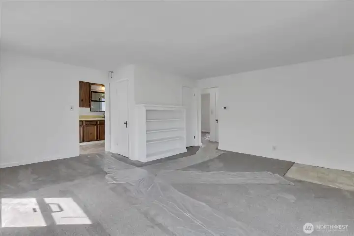 Living room looking into the kitchen.
