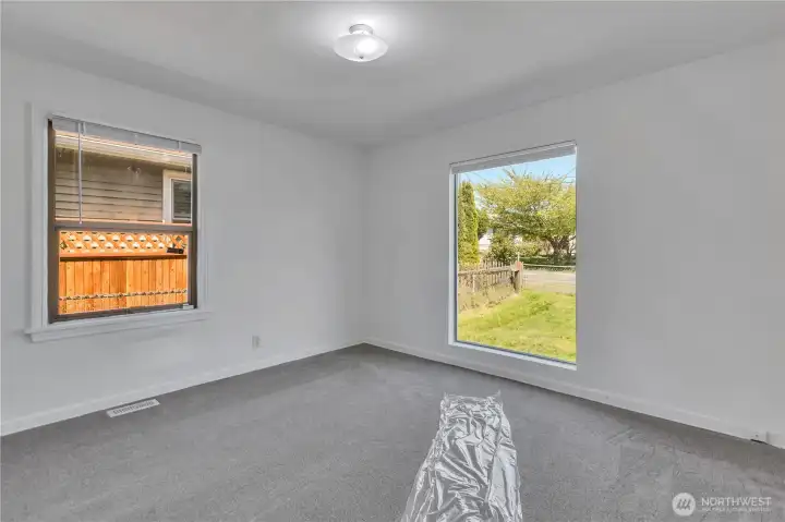 Large window with view of the yard. Lots of natural light.