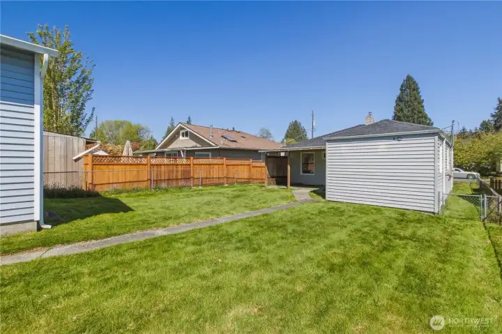 Spacious backyard. Fully fenced.
