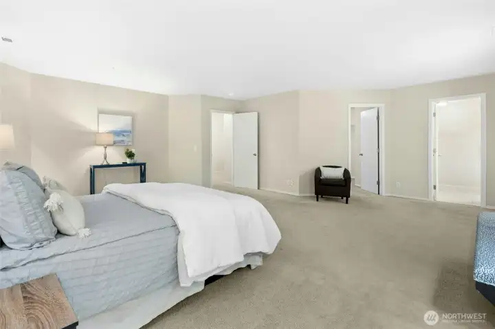 Huge primary bedroom with peaceful views