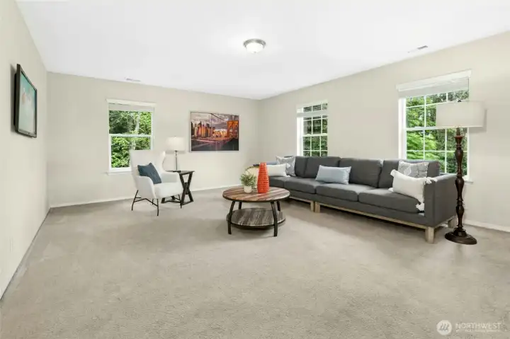 Spacious bonus/flex room with natural light
