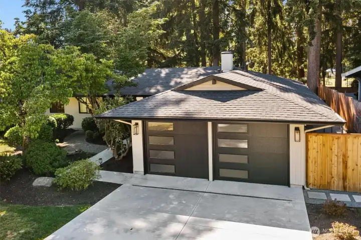 New roof, new driveway and walkways, new insulated garage door, new windows, new fencing. New roof, new driveway and walkways, new insulated garage door, new windows, new fencing.