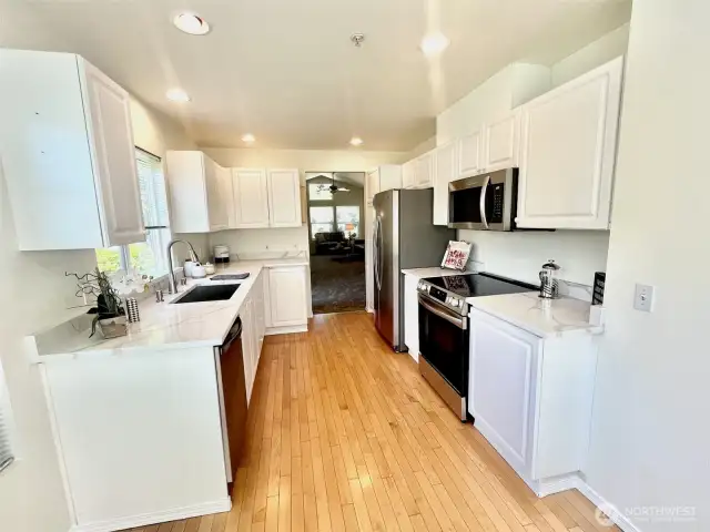 Beautiful kitchen with hardwood floors.