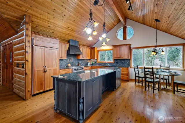 Vaulted Kitchen with Granite and Wolf Range