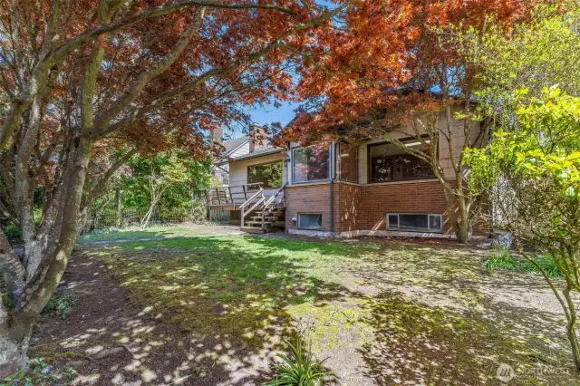 Located high above the street, this sweetie home is ready for your updates and special touches.