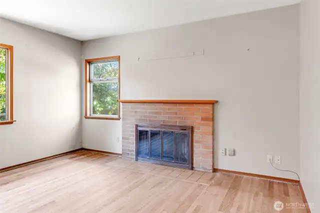 Original hardwood floors featured in the living room.