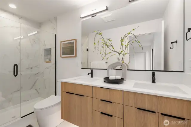 Primary Bathroom features dual sink vanity with motion sensor undercabinet lighting.